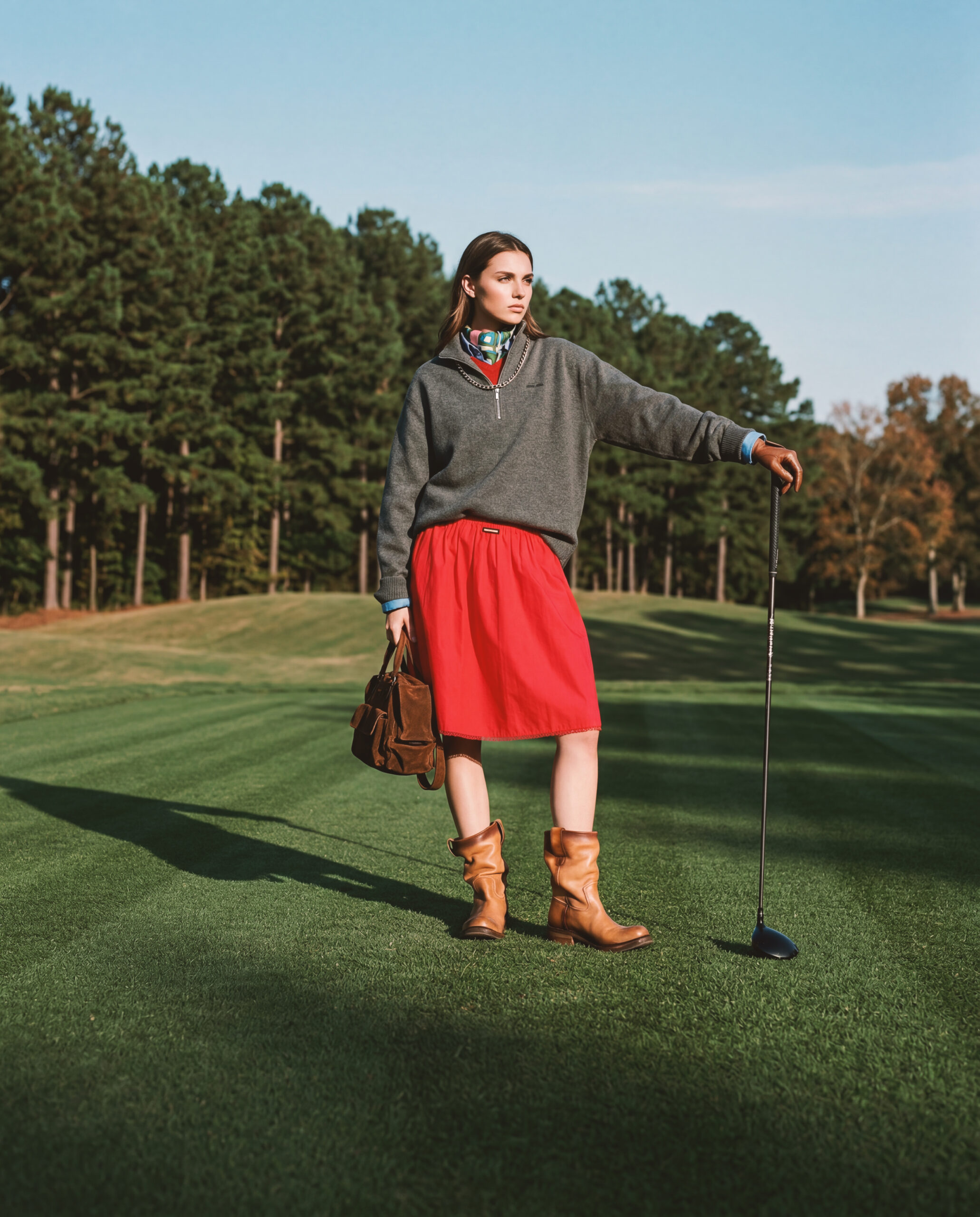 KI-produzierte Fashion-Kampagne: On-Model-Motive einer Kollektion im sportlich-eleganten Editorial-Stil auf einem Golfplatz.